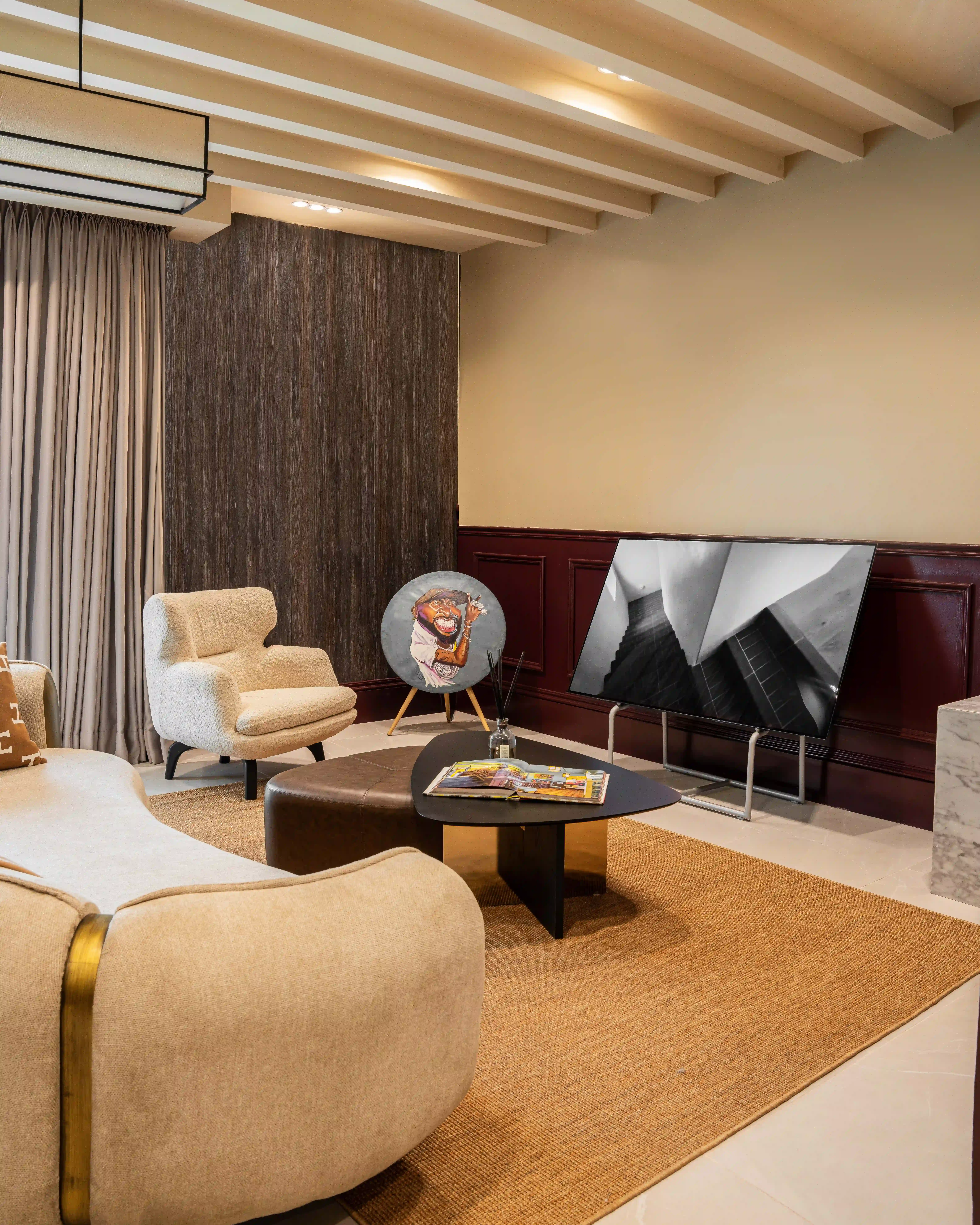Modern dining room with warm tones and contemporary furniture