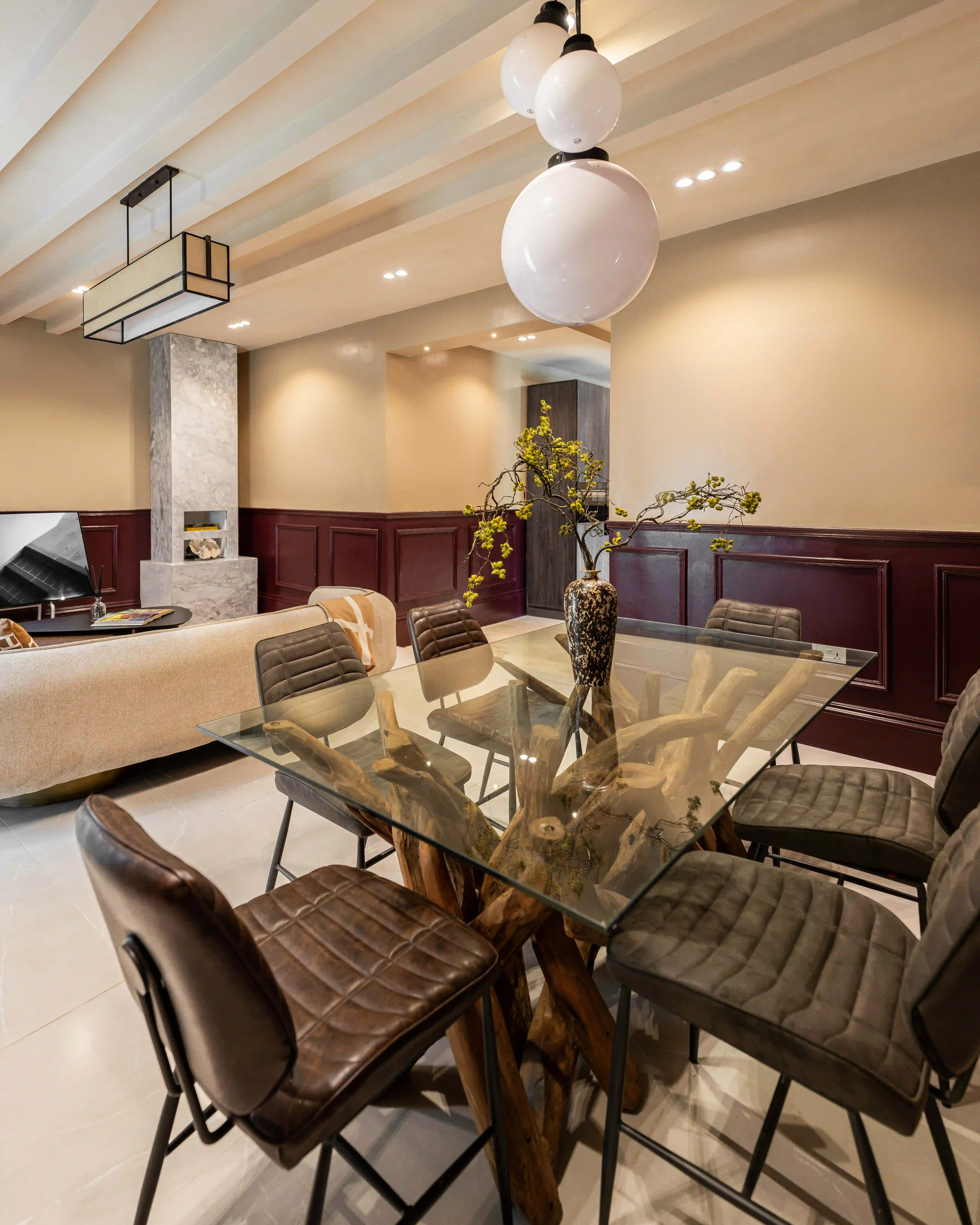 Modern dining room with warm tones and contemporary furniture
